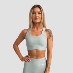 Stanik sportowy damski fitness z regulowanymi ramiączkami Limitless. Zielone biustonosze sportowe damskie GYMBEAM, bez wzorów, z elastanu. Za 85.90 zł.