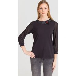 BLUZKA LIU JO. Czarne bluzki damskie Liu Jo, l, z aplikacjami, z tkaniny, bez kołnierzyka, bez ramiączek. Za 229.50 zł.