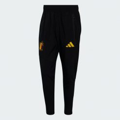 Spodnie Belgia Tiro Travel. Czarne spodnie dresowe męskie Adidas, bez wzorów, z dresówki. Za 329.00 zł.