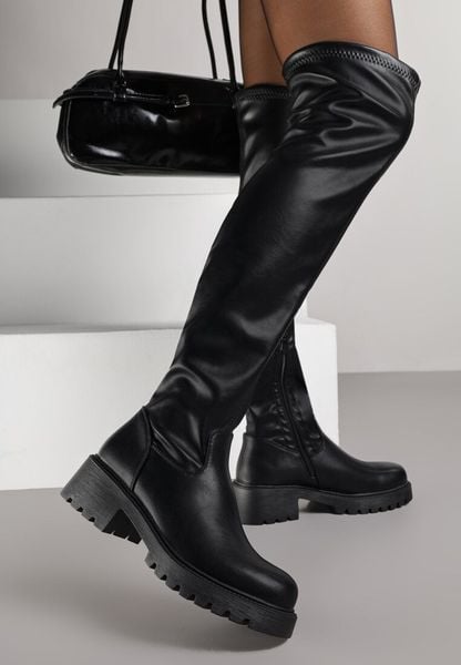 Czarne Kozaki w Stylu Tech Gothic Aderida. Czarne kozaki damskie Renee, z jeansu, bez obcasa, na płaskiej podeszwie. Za 169.99 zł.