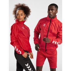Kurtka ortalionowa piłkarska dla dorosłych Hummel Core XK Spray Jacket. Czerwone kurtki damskie HUMMEL, xl, bez wzorów, bez kaptura. Za 168.00 zł.