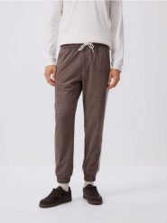 Spodnie jogger z lampasami - brązowy. Brązowe spodnie materiałowe męskie Reserved, bez wzorów, z tkaniny. Za 139.99 zł.