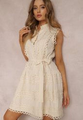 Jasnobeżowa Sukienka Ismeia. Brązowe sukienki damskie Renee, m, bez wzorów, z koronki, boho, bez kołnierzyka, bez ramiączek, mini, dopasowane. Za 199.99 zł.