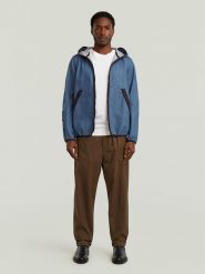 G-Star Spodnie chino w kolorze jasnobrązowym rozmiar: W33/L/34. Brązowe spodnie materiałowe męskie G-Star, bez wzorów, z bawełny, retro. Za 259.95 zł.