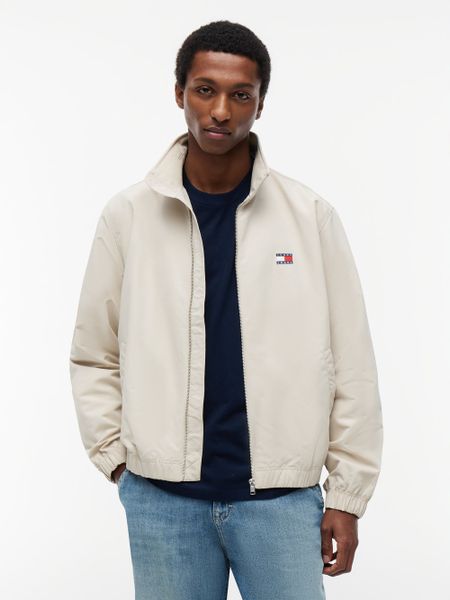 Tommy Jeans kurtka przejściowa Mężczyźni beżowy, M. Brązowe kurtki męskie Tommy Jeans, m, bez wzorów, z jeansu, sportowe, bez kaptura. Za 569.95 zł.