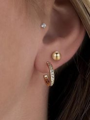 Les Favorites Pozłacane kolczyki-półkreole z cyrkoniami rozmiar: onesize. Kolczyki damskie Les Favorites, z cyrkonią, pozłacane. Za 78.99 zł.