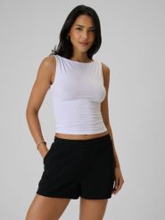 4F Top slim z modalem damski - biały L. Białe topy damskie 4f, l, bez wzorów, z dzianiny, bez kołnierzyka. Za 49.99 zł.