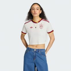 Koszulka wyjazdowa o krótkim kroju Hiszpania 26. Białe bluzki sportowe damskie Adidas, xl, z aplikacjami, z materiału, bez ramiączek. Za 307.00 zł.