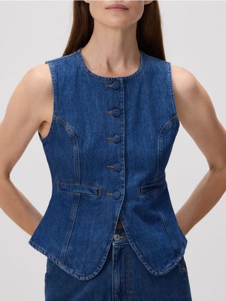 Jeansowa kamizelka - niebieski. Niebieskie kamizelki damskie Reserved, l, z bawełny, krótkie. W wyprzedaży za 69.99 zł.