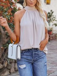 Milan Kiss Top w kolorze beżowym rozmiar: S. Brązowe topy damskie Milan Kiss, s, bez wzorów, bez kołnierzyka. Za 140.95 zł.