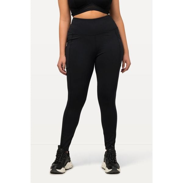 Damskie Legginsy sportowe szybkoschnące bardzo elastyczne. Czarne legginsy damskie Ulla Popken, plus size, bez wzorów, z materiału, na jogę i pilates. Za 239.99 zł.