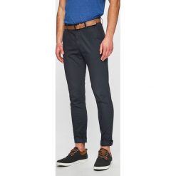 Tom Tailor Denim - Spodnie. Niebieskie spodnie materiałowe męskie Tom Tailor Denim, bez wzorów, z bawełny, casualowe. W wyprzedaży za 139.90 zł.
