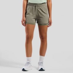 Spodenki damskie Odlo ZEROWEIGHT 3 INCH 2-in-1 short. Zielone szorty damskie Odlo, bez wzorów, sportowe. Za 339.99 zł.