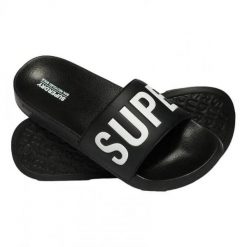 Superdry Core Pool Sliders - klapki z wyściełanym paskiem – BLACK/WHITE. Czarne klapki i japonki męskie Superdry., z poliesteru. Za 174.20 zł.