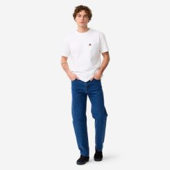 Dżinsy na deskorolkę DN900 z grubej bawełny indygoProsty luźny krój "relaxed". Jeansy męskie Decathlon. Za 179.99 zł.