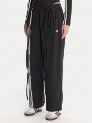 Adidas Spodnie dresowe Ribbon Parachute JV9727 Czarny Loose Fit. Czarne spodnie dresowe damskie Adidas, m, bez wzorów, z dresówki. Za 349.99 zł.