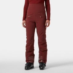 Spodnie narciarskie dla kobiet Helly Hansen Alphelia Hi Waist. Czerwone spodnie dresowe damskie Helly Hansen, na zimę, bez wzorów. W wyprzedaży za 1,207.50 zł.
