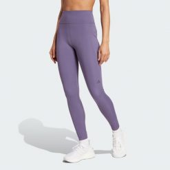 Legginsy Own the Run 7/8. Fioletowe legginsy sportowe damskie Adidas, xs, bez wzorów, z materiału, do biegania. W wyprzedaży za 217.62 zł.