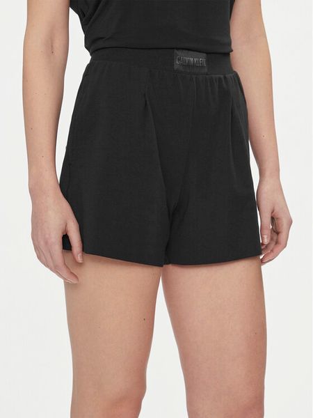 Calvin Klein Underwear Szorty materiałowe 000QS7132E Czarny Relaxed Fit. Czarne szorty damskie Calvin Klein Underwear, bez wzorów, z bawełny. Za 169.99 zł.