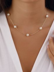 Luja Bijoux Pozłacany naszyjnik z perłami - dł. 42 cm rozmiar: onesize. Żółte naszyjniki damskie Luja Bijoux, metalowe. Za 43.99 zł.