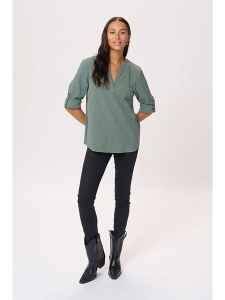 Kaffe Bluzka w kolorze turkusowym rozmiar: 42. Niebieskie bluzki damskie Kaffe, bez wzorów, z bawełny, bez kołnierzyka, bez ramiączek. Za 60.99 zł.