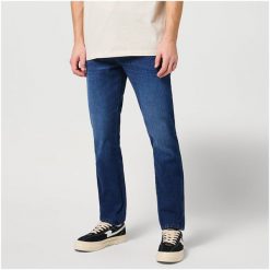WRANGLER TEXAS SLIM MĘSKIE SPODNIE JEANSOWE JEANSY DŻINSY BLUE SOUL 112350661 W12S017997. Niebieskie jeansy męskie Wrangler. Za 229.99 zł.