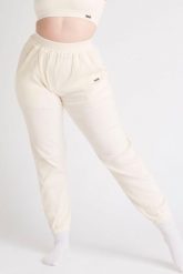Spodnie dresowe LOEWI prążkowane, miękka bawełna 450 g/m² – żółty. Żółte spodnie sportowe damskie AESTHETIC WOLF, m, z bawełny, na fitness i siłownię. Za 129.99 zł.