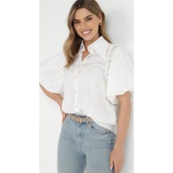 Biała Koszula Caneope. Białe koszule damskie Born2be, m, z aplikacjami, z tkaniny, klasyczne, bez kołnierzyka, bez ramiączek. Za 54.99 zł.