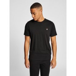 HUMMEL bluzka bawełniana hmlIC FRED T-SHIRT. Czarne t-shirty męskie HUMMEL, xl, bez wzorów, z bawełny, bez kołnierzyka. Za 49.99 zł.