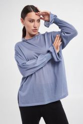Sweter kaszmirowy WOLFORD. Swetry klasyczne damskie Wolford, m, z kaszmiru, bez kołnierzyka. W wyprzedaży za 1,303.47 zł.
