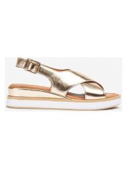 Unisa Skórzane sandały w kolorze złotym na koturnie rozmiar: 37. Żółte sandały damskie Unisa, bez wzorów, bez obcasa, na koturnie. Za 173.99 zł.