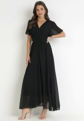 Czarna Kopertowa Sukienka Maxi z Gumką w Pasie Narlin. Czarne sukienki damskie Born2be, na co dzień, na lato, uniwersalny, bez wzorów, eleganckie, bez kołnierzyka, bez ramiączek, maxi, kopertowe. W wyprzedaży za 111.99 zł.