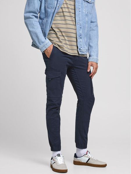 Jack & Jones Spodnie materiałowe Paul 12169582 Granatowy Tapered Fit. Niebieskie spodnie materiałowe męskie Jack & Jones, bez wzorów, z bawełny. Za 169.99 zł.