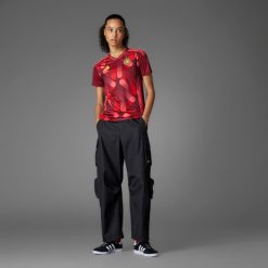 Koszulka piłkarska damska ADIDAS Niemcy 2025 wyjazdowa. Czerwone bluzki damskie Adidas, m, bez wzorów, z materiału, sportowe, bez kołnierzyka, bez ramiączek. Za 459.99 zł.
