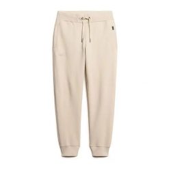 Spodnie do biegania Superdry. Brązowe spodnie materiałowe męskie Superdry., bez wzorów, z materiału, eleganckie. Za 326.35 zł.