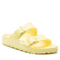 Klapki Birkenstock. Żółte klapki damskie Birkenstock, bez wzorów, bez obcasa. Za 189.99 zł.
