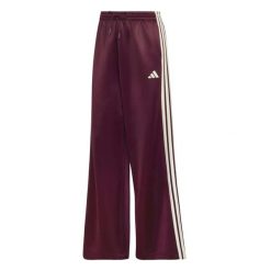 Spodnie Adidas Sport W Stadium Tp Damskie. Fioletowe spodnie materiałowe damskie Adidas, m, z bawełny, do biegania. Za 357.99 zł.