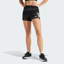 Szorty Own the Run. Czarne spodenki sportowe damskie Adidas, l, z materiału, do biegania. Za 179.00 zł.