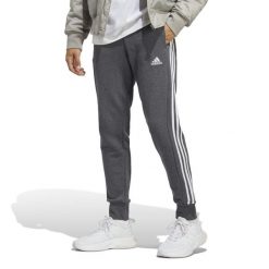 Spodnie męskie adidas Essentials French Terry Tapered Cuff 3-Stripes. Białe spodnie sportowe męskie Adidas. Za 210.40 zł.