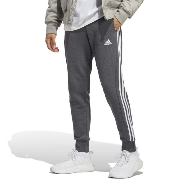 Spodnie męskie adidas Essentials French Terry Tapered Cuff 3-Stripes. Białe spodnie sportowe męskie Adidas. Za 207.75 zł.