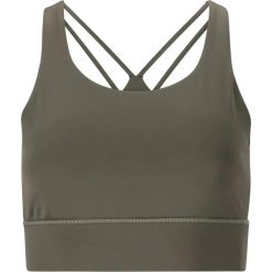 Biustonosz dla kobiet Athlecia Lavigne. Zielone biustonosze sportowe damskie Athlecia, bez wzorów, z materiału. Za 127.00 zł.