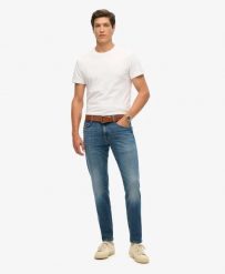 Superdry Denimowe Jeansy Slim Vintage z Bawełny Organicznej. Niebieskie jeansy męskie Superdry. Za 440.85 zł.