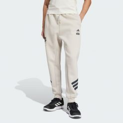 Spodnie Dresowe Adidas Star Wars The Mandalorian. Brązowe spodnie dresowe męskie Adidas, z dresówki. W wyprzedaży za 209.40 zł.