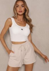 Biały Top Prążkowany z Usztywnianymi Miseczkami Ozdobiony Literą Nevoliene. Białe topy damskie Renee, l, bez wzorów, z dzianiny, bez kołnierzyka. Za 39.99 zł.