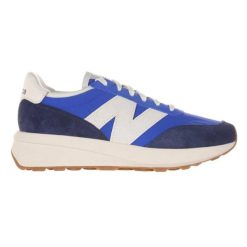 Męskie trampki 370 z zamszu (Granatowy/Zielony Kamień). Niebieskie trampki i tenisówki męskie New Balance, bez wzorów, z materiału, bez zapięcia. Za 526.70 zł.