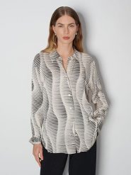 Someday Bluzka w kolorze beżowo-czarnym rozmiar: 38. Brązowe bluzki damskie Someday, bez wzorów, z wiskozy, bez kołnierzyka, bez ramiączek. Za 143.99 zł.