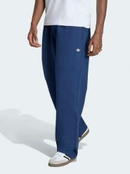 Adidas Spodnie dresowe w kolorze granatowym rozmiar: M. Niebieskie spodnie dresowe męskie Adidas, bez wzorów, z dresówki. Za 184.95 zł.
