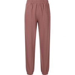 Damskie spodnie dresowe Athlecia Carmen. Brązowe spodnie sportowe damskie Athlecia, z dresówki, na fitness i siłownię. Za 180.00 zł.