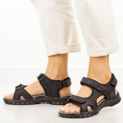 Czarne skórzane sandały damskie Unisoft 129. Czarne sandały damskie Unisoft, bez wzorów, z materiału, bez obcasa, na płaskiej podeszwie. Za 219.00 zł.