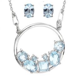 TARA komplet srebrnej biżuterii naszyjnik kolczyki blue topaz 4 ct. Niebieskie kolczyki damskie Enaya, z granatem, metalowe, na sztyftcie. Za 542.00 zł.